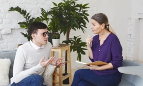 a person having consultation with his psychologist